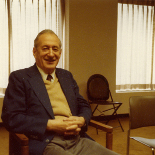 Vacchiano smiling inside his studio at Juilliard