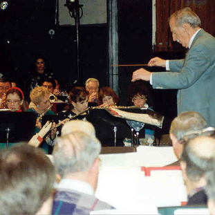 Vacchiano conducting a community band